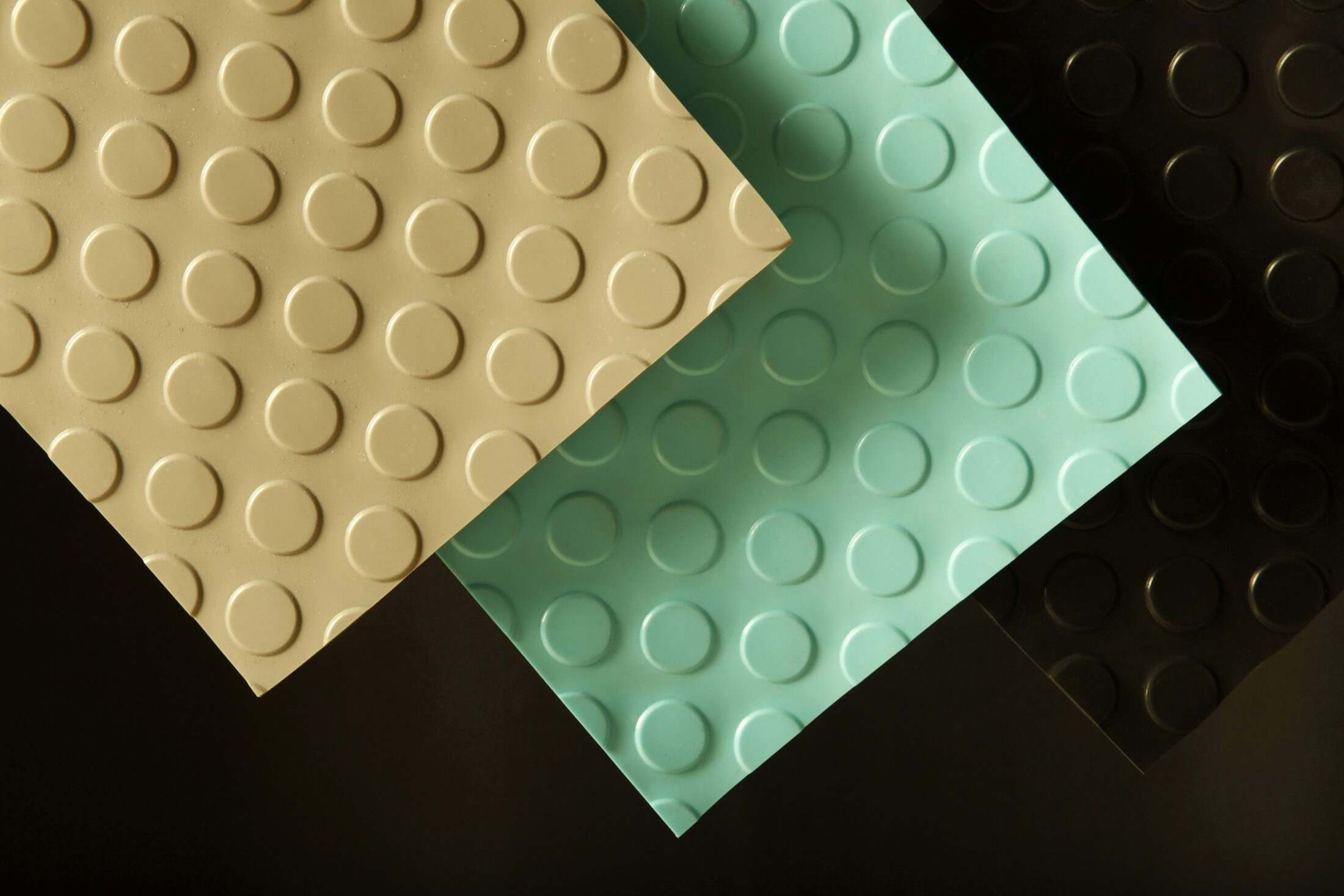 assortment of non-slip mats in various colors